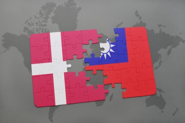 bir dünya haritası arka plan üzerinde Danimarka ve Tayvan ulusal bayrağı ile bulmaca.