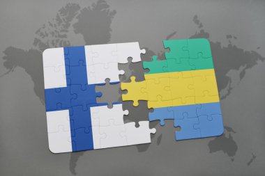 bir dünya haritası arka plan üzerinde finlandiya ve gabon ulusal bayrağı ile bulmaca.