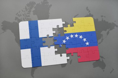 bir dünya haritası arka plan üzerinde Finlandiya ve Venezuela ulusal bayrağı ile bulmaca.