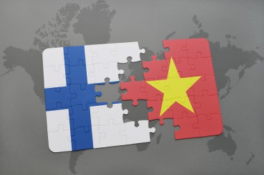 Finlandiya ve vietnam ulusal bayrak dünya harita arka plan üzerinde ile bulmaca.