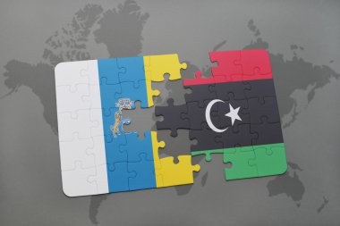 Kanarya Adaları ve libya ulusal bayrak dünya harita arka plan üzerinde ile bulmaca.