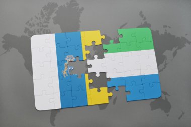 Kanarya Adaları ve sierra leone dünya harita arka plan üzerinde bayrağı ile bulmaca.