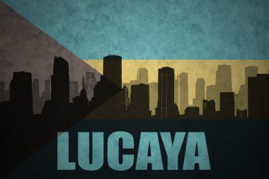 Özet metin Lucaya Vintage ile şehir silüeti Bahamalar bayrağı