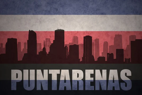 Abstract silhouette of the city with text Puntarenas at the vintage costa rican flag — Stock Photo, Image