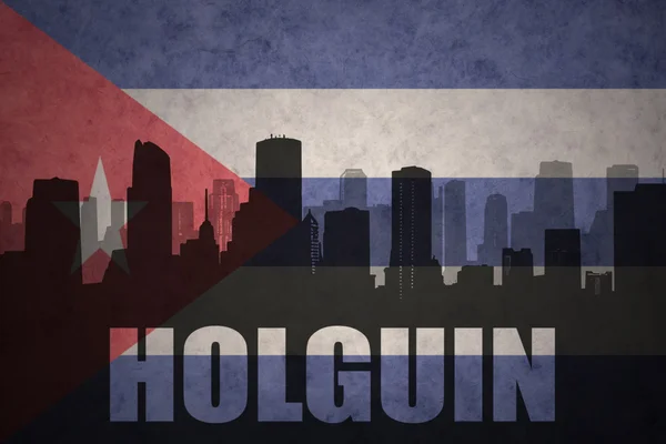 Streszczenie sylwetka miasta z tekstem Holguin o flagę kubańską vintage — Zdjęcie stockowe