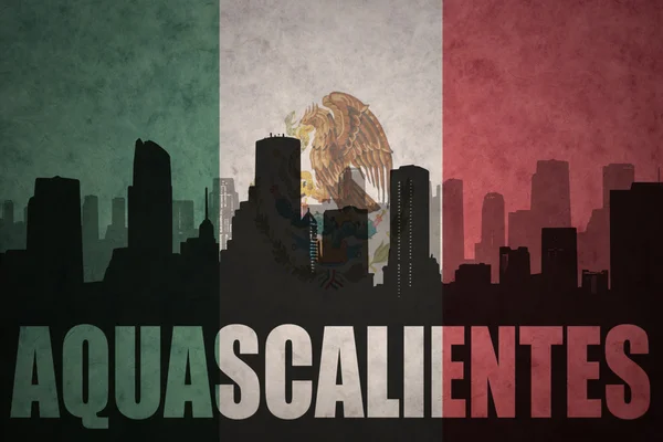 Abstract silhouette of the city with text Aguascalientes at the vintage mexican flag — Stock Photo, Image