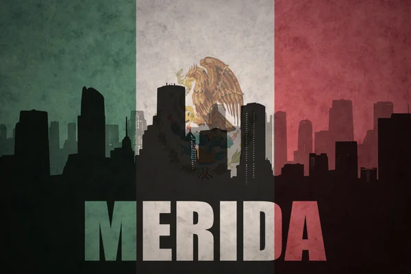 Streszczenie sylwetka miasta z tekstem Merida na vintage flagę meksykański — Zdjęcie stockowe