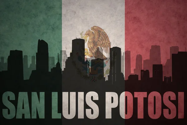 Abstract silhouette of the city with text San Luis Potosi at the vintage mexican flag — Stock Photo, Image