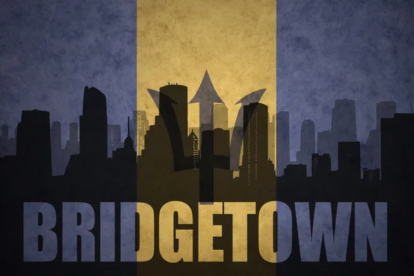 Abstract silhouette of the city with text Bridgetown at the vintage barbados flag — Stock Photo, Image