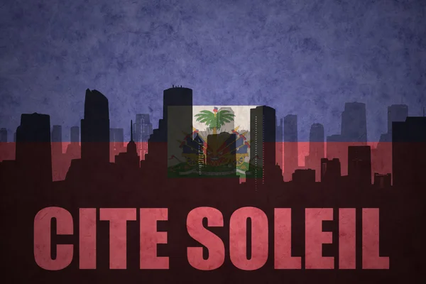 Streszczenie sylwetka miasta z tekstem Cite Soleil w vintage flaga Haiti — Zdjęcie stockowe