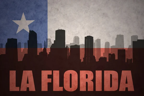 Abstract silhouette of the city with text La Florida at the vintage chilean flag — Stock Photo, Image