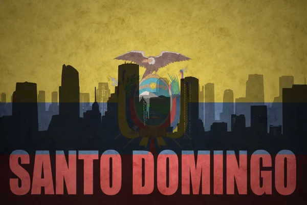 Silhueta abstrata da cidade com texto Santo Domingo na bandeira equatoriana vintage — Fotografia de Stock