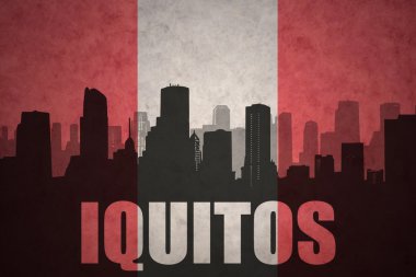 Özet metin Iquitos Vintage ile şehir silüeti Perulu bayrak
