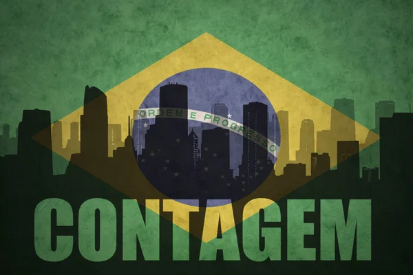 Abstract silhouette of the city with text Contagem at the vintage brazilian flag — Stock Photo, Image