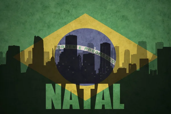 Abstrakte Silhouette der Stadt mit Text auf der brasilianischen Flagge — Stockfoto