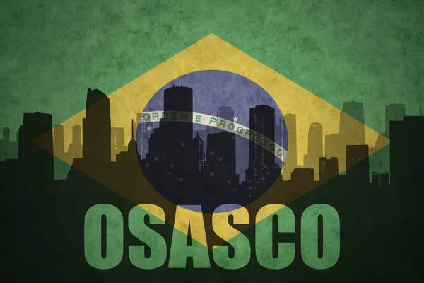 Resumo silhueta da cidade com texto Osasco na bandeira brasileira vintage — Fotografia de Stock
