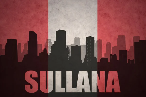 Abstract silhouette of the city with text Sullana at the vintage peruvian flag — Stock Photo, Image
