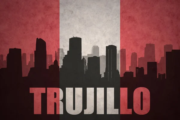 Streszczenie sylwetka miasta z tekstem Trujillo w vintage peruwiańskiej flagi — Zdjęcie stockowe