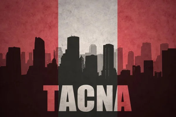 Abstract silhouette of the city with text Tacna at the vintage peruvian flag — Stock Photo, Image