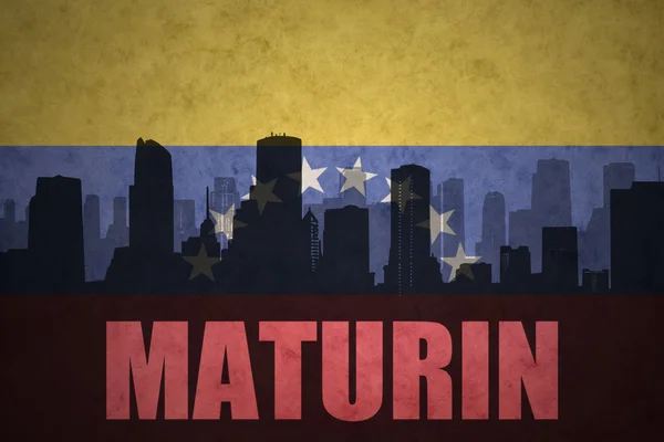 Abstract silhouette of the city with text Maturin at the vintage venezuelan flag — Stock Photo, Image