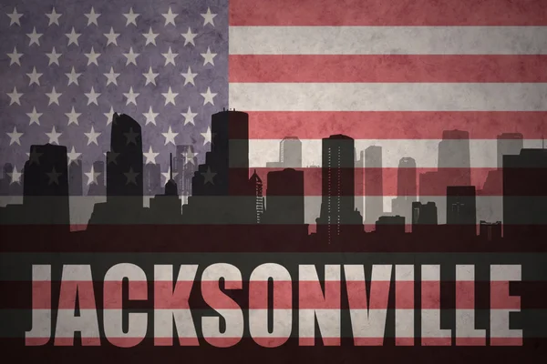 Silueta abstracta de la ciudad con texto Jacksonville en la bandera americana vintage —  Fotos de Stock