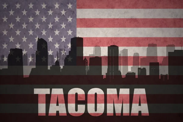 Silhouette abstraite de la ville avec texte Tacoma au drapeau américain vintage — Photo