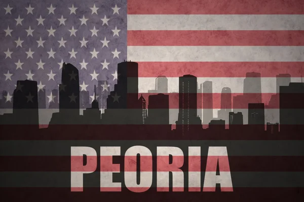Silueta abstracta de la ciudad con texto Peoria en la bandera americana vintage —  Fotos de Stock