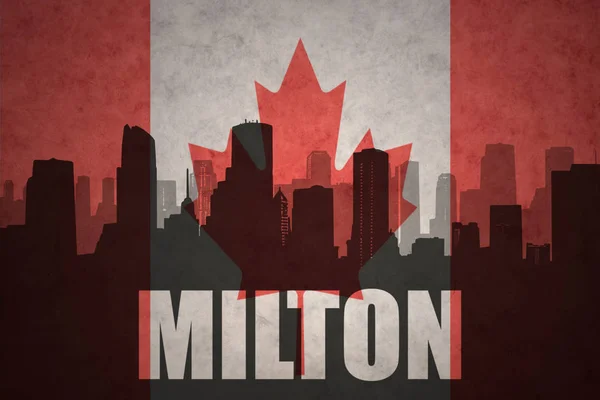 Özet metni Milton vintage Kanada bayrağı ile şehir silüeti — Stok fotoğraf