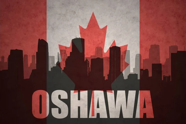 Абстрактный силуэт города с текстом Ошава на винтажном канадском флаге — стоковое фото
