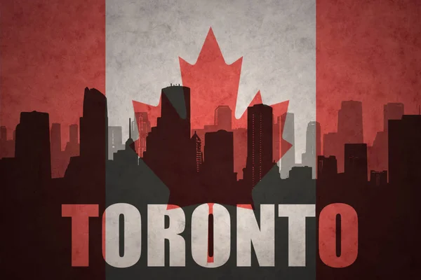 Abstracte silhouet van de stad met tekst Toronto op de vintage Canadese vlag — Stockfoto