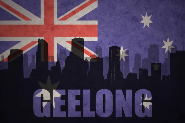 Abstract silhouette of the city with text Geelong at the vintage australian flag — Stock Photo, Image