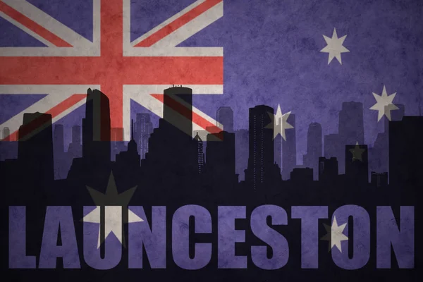 Abstrakte Silhouette der Stadt mit Schriftzug auf der australischen Flagge — Stockfoto