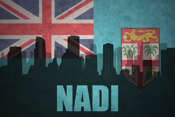 Silueta abstracta de la ciudad con texto Nadi en la bandera de Fiyi vintage —  Fotos de Stock