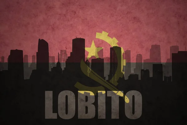 Abstract silhouette of the city with text Lobito at the vintage angolan flag — Stock Photo, Image