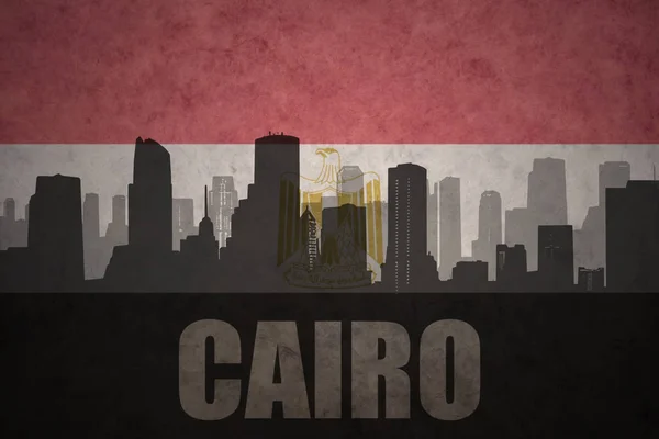 Özet metni vintage Mısır bayrağı Cairo ile şehir silüeti — Stok fotoğraf