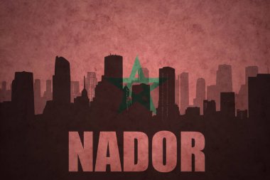 Özet metin Nador, vintage Fas bayrağı ile şehir silüeti