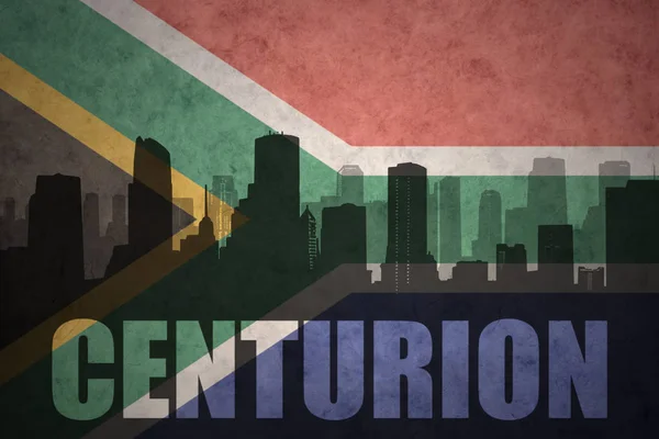 Abstracte silhouet van de stad met tekst Centurion bij de vintage vlag van Zuid-Afrika — Stockfoto