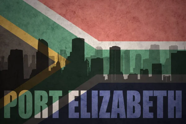 Abstracte silhouet van de stad met tekst Port Elizabeth op de vintage vlag van Zuid-Afrika — Stockfoto