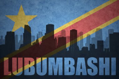 abstract silhouette of the city with text Lubumbashi at the vintage democratic republic of the congo flag clipart