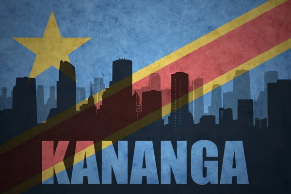 ビンテージ民主共和国コンゴの旗のテキスト カナンガと都市の抽象的なシルエット — ストック写真