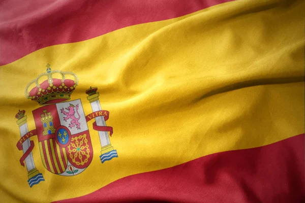 Agitant drapeau coloré de l'Espagne . — Photo