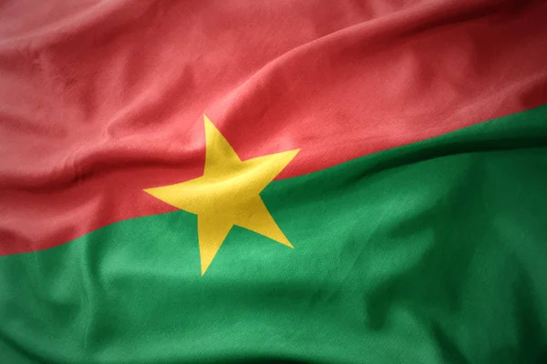 Waving colorful flag of burkina faso. — Stock Photo, Image