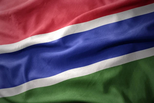 Macha kolorowe flagę z Gambii. — Zdjęcie stockowe
