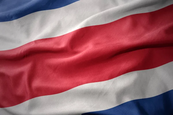 Wuivende kleurrijke vlag van costa rica. — Stockfoto