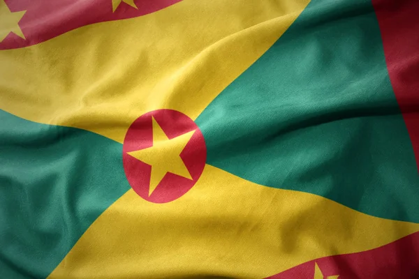 Macha kolorowe flagę Grenada. — Zdjęcie stockowe