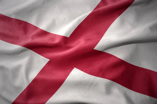 Хвилястий барвистий прапор штату Алабама . — стокове фото