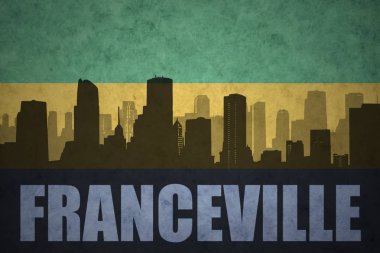 Özet metni Franceville vintage Gabon bayrağı ile şehir silüeti