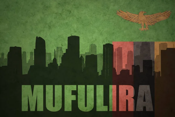 Streszczenie sylwetka miasta z tekstem Mufulira w vintage flaga Zambii — Zdjęcie stockowe