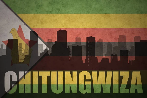 Streszczenie sylwetka miasta z tekstem Chitungwiza o vintage flaga Zimbabwe — Zdjęcie stockowe