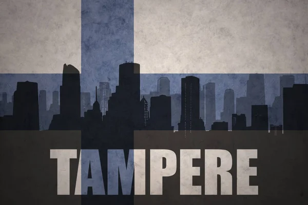 Abstrakte Silhouette der Stadt mit Text-Tampere an der finnischen Flagge — Stockfoto